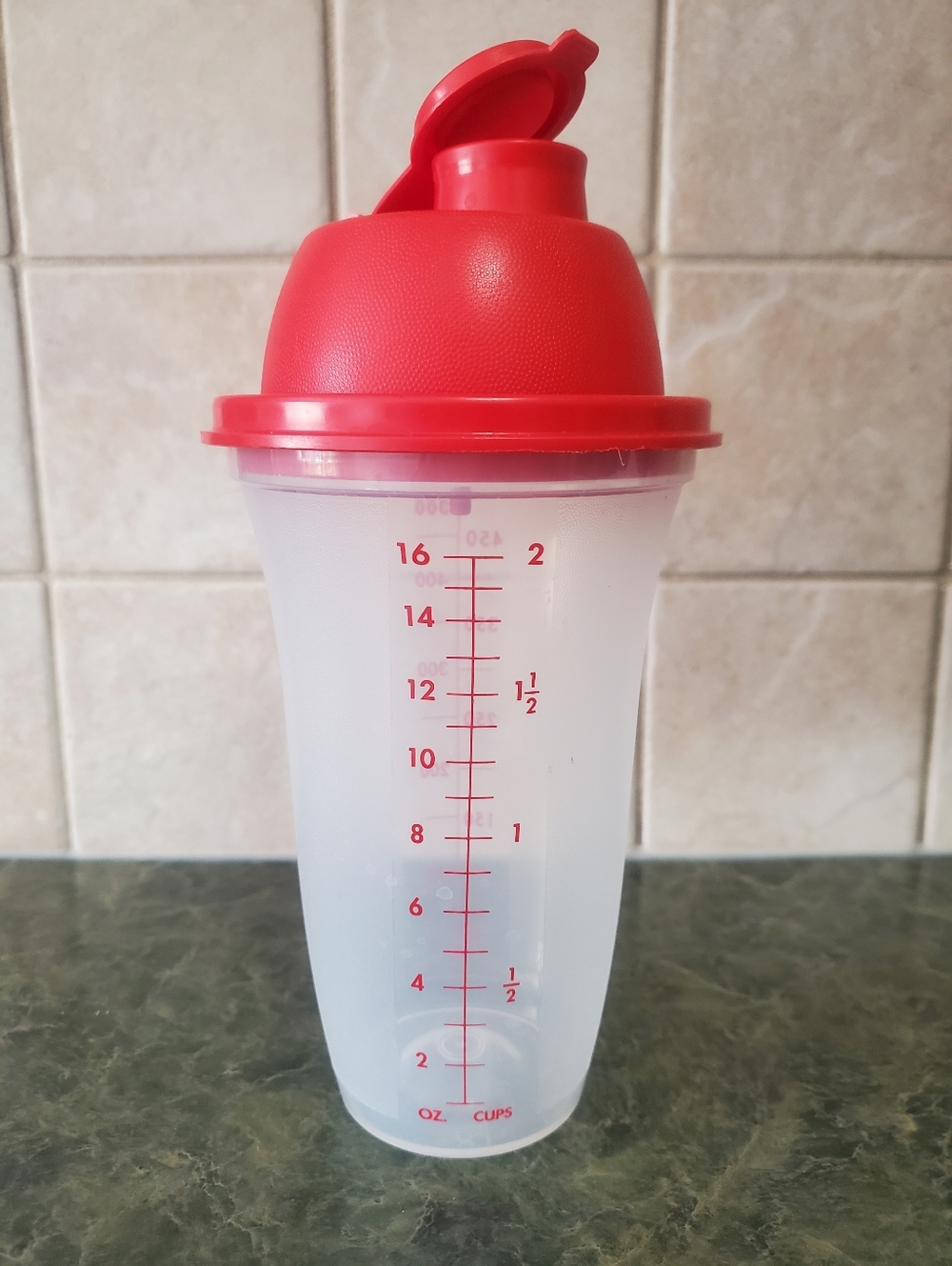 Tupperware Red and Clear Mixing Shaker Bottle